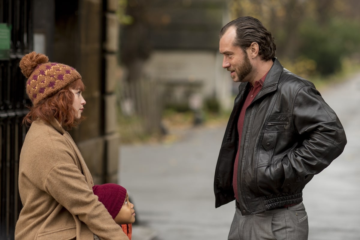 Jude Law as Dom Hemingway and Emilia Clarke as his estranged daughter Evelyn in the 2013 British black comedy–crime drama film Dom Hemingway