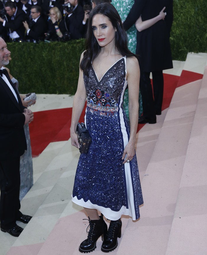 On the Met Gala steps, Connelly revealed the full look, pairing her ornate dress with chunky lace-up Louis Vuitton combat boots