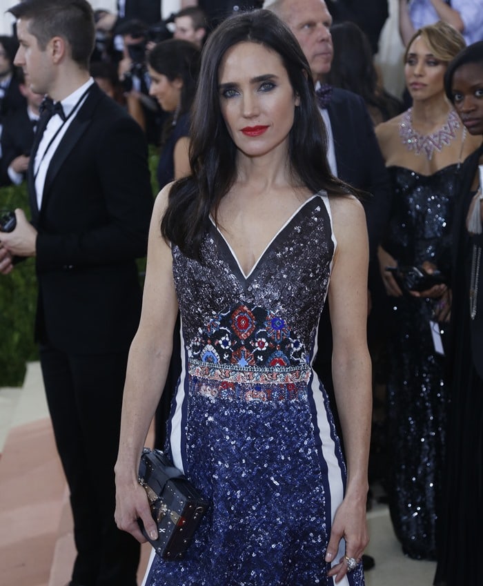 Jennifer Connelly shows off the intricate sequin and leather paneling of her Louis Vuitton gown at the 2016 Met Gala