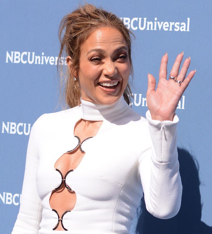 Jennifer Lopez's dress features three keyhole cutouts and silver metal details