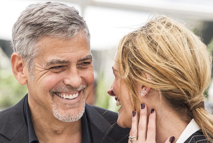 George Clooney and Julia Roberts share a moment at the 2016 Cannes Film Festival