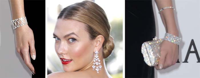 Karlie Kloss accessorizes with diamond earrings, bracelets and a clutch