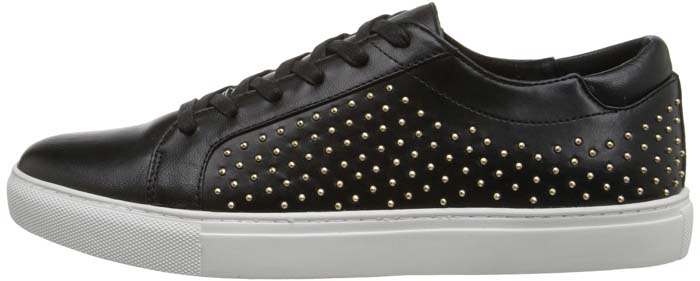 Studded Kenneth Cole “Kam” sneakers add a tougher edge to the minimalist design with gold-tone embellishments that bring subtle texture and attitude to the clean low-top silhouette