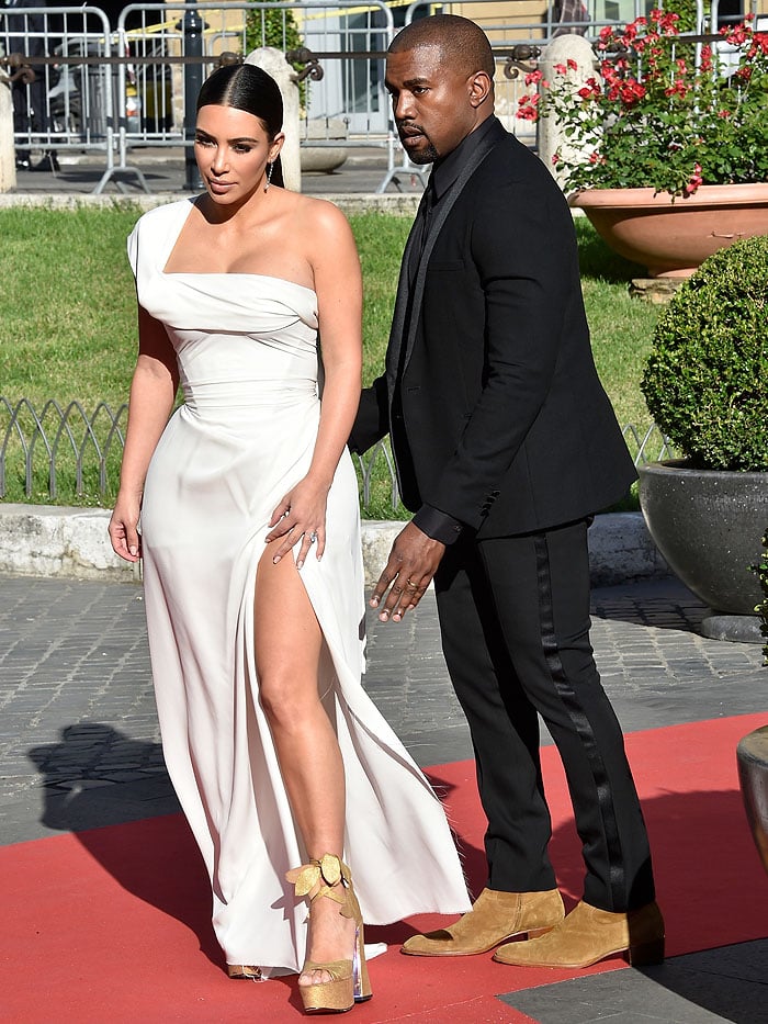 Husband-and-wife Kim Kardashian West and Kanye West hitting the "La Traviata" Opening Gala red carpet