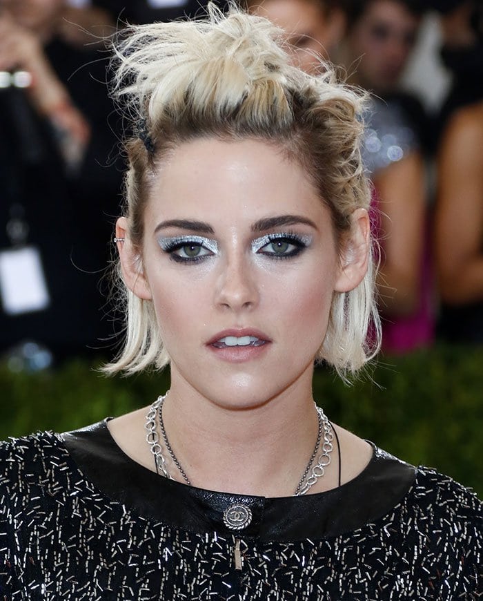 Kristen Stewart shows off her bleached hair and dark roots at the "Manus x Machina: Fashion In An Age Of Technology" Costume Institute Gala