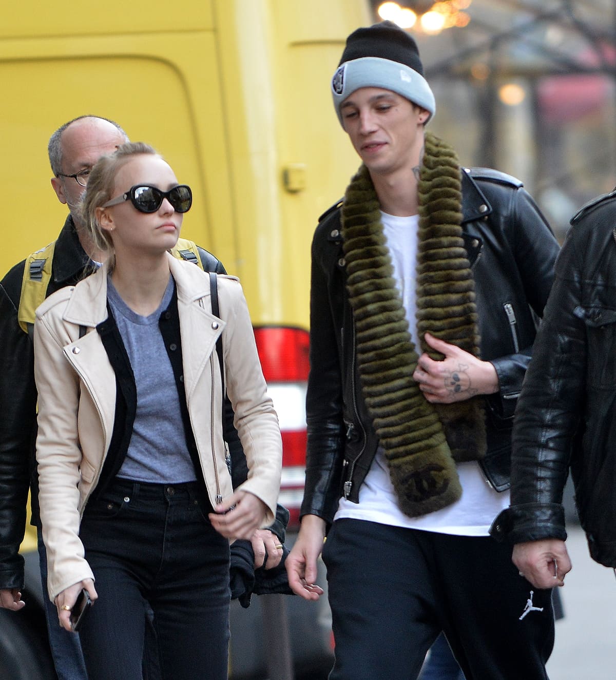 Lily-Rose Depp's off-duty style includes a light-colored jacket and dark pants, offering a glimpse into her casual fashion choices