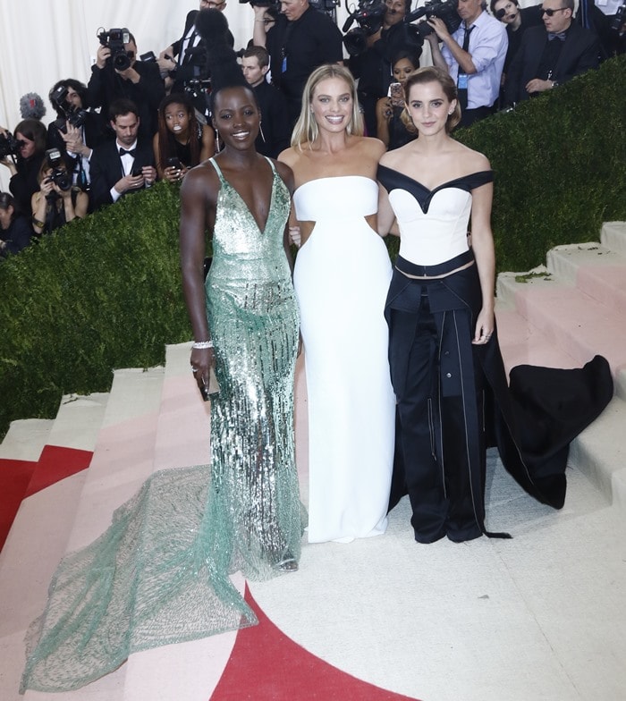 Lupita Nyong’o appears noticeably taller alongside Margot Robbie and Emma Watson at the Met Gala, thanks to a combination of sleek heels and her dramatic, towering updo, which added extra height above the Calvin Klein Collection gown
