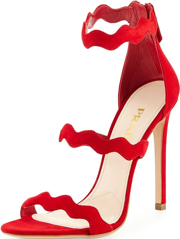 The red suede finish enhances the saturated, head-to-toe color story while maintaining a refined, tactile softness