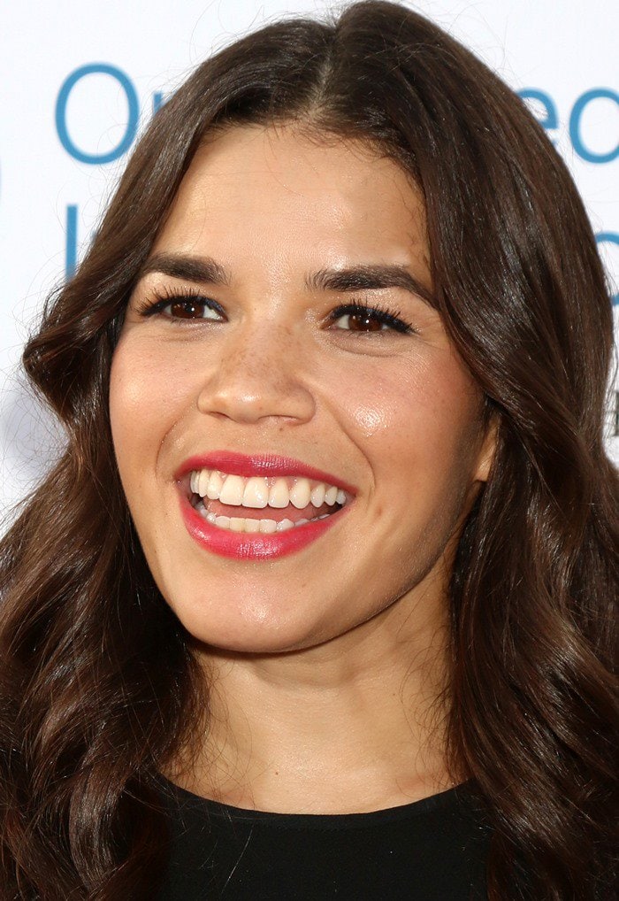 America Ferrera completes her radiant look with glossy curls and a bright pink lip, exuding effortless confidence at the Stand for Kids Gala in Century City, California, on June 18, 2016