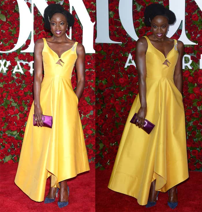 Danai Gurira brightens the red carpet in a mustard Rosie Assoulin dress, complemented by glittering blue Paul Andrew pumps and a purple clutch for a bold color-block finish