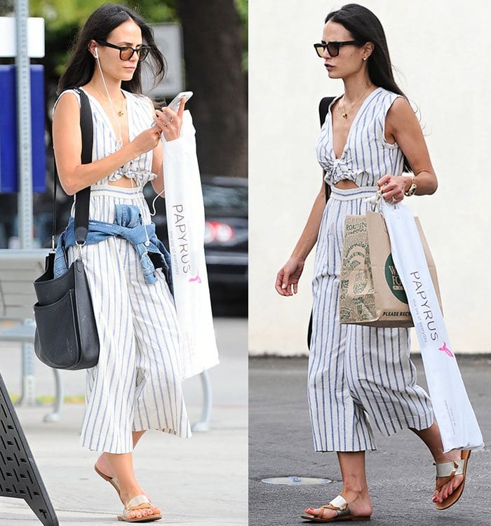 Jordana Brewster keeps it effortlessly chic in a striped Madewell jumpsuit and Soludos leather sandals while shopping in Santa Monica