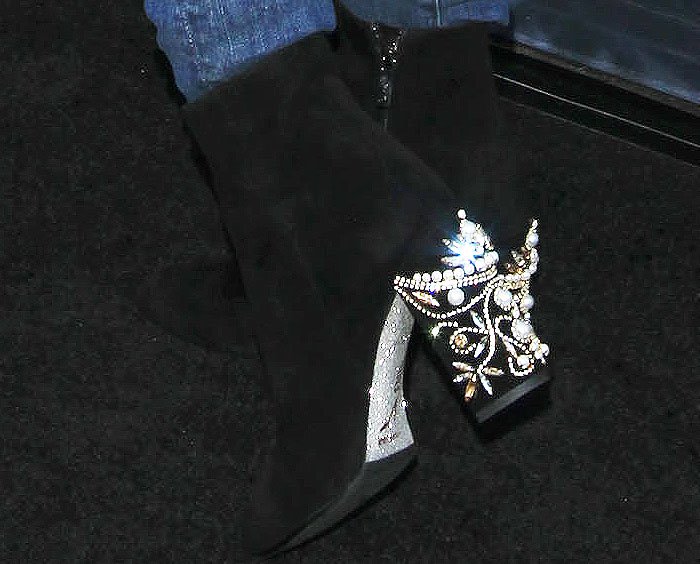 A closer look at the ornate, jewel-covered heels on Hale’s black René Caovilla boots reveals the brand’s signature glamour