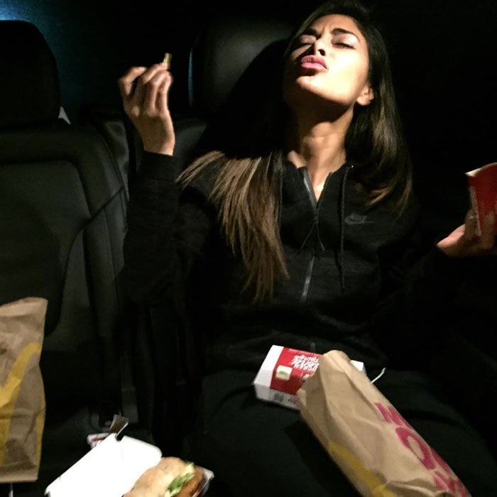 Nicole Scherzinger enjoys a fast food meal after a glamorous night out, showing off her fun and carefree side
