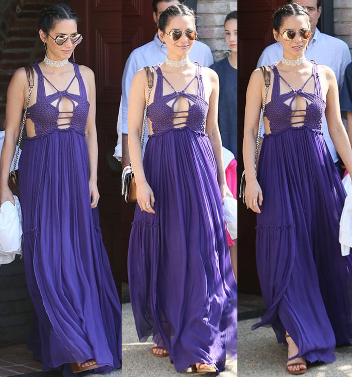 Olivia Munn stepped out of Joel Silver’s Memorial Day party in a flowing purple Alberta Ferretti maxi dress, styled with Stuart Weitzman “NearlyNude” sandals and chic accessories