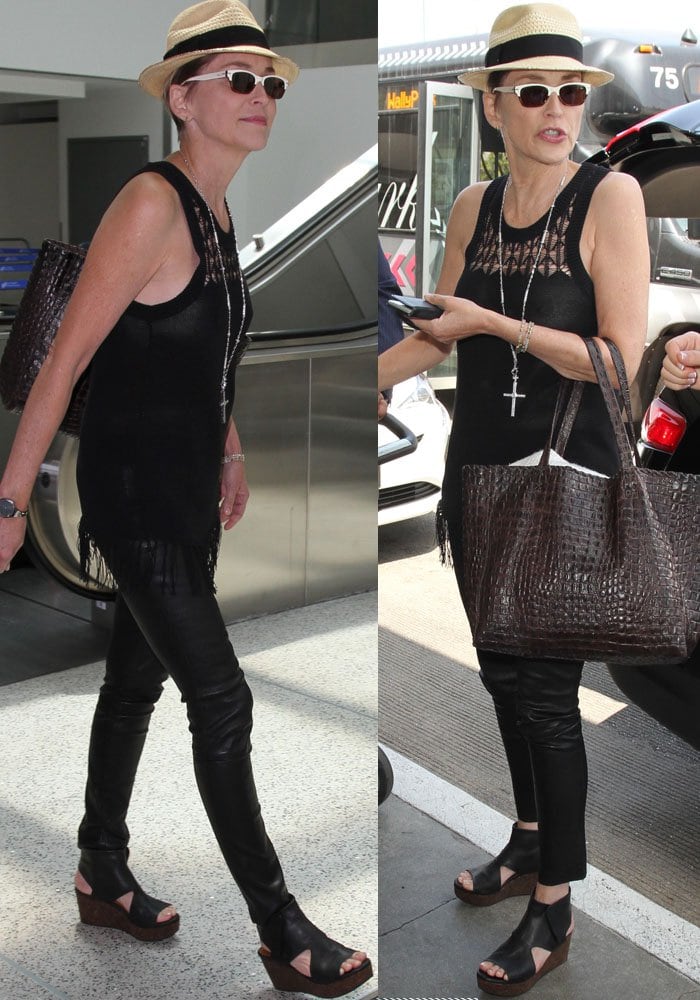 Sharon Stone keeps it sleek in leather pants and a sheer black knit tank, grounding the look with cutout wedge sandals that balance edge with all-day ease