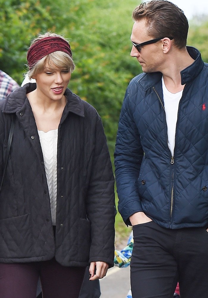 Taylor Swift and her boyfriend, Tom Hiddleston, enjoy a romantic walk on the beach near Lowestoft in Suffolk, England