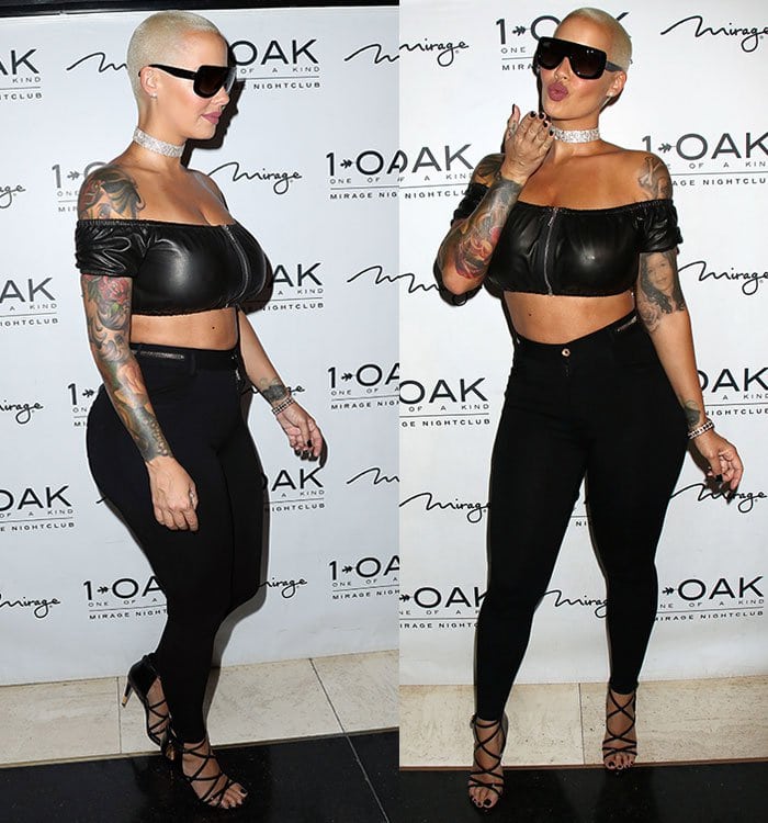 Blowing a kiss to photographers, she balanced edgy attitude with high-glam polish in her black leather-and-leggings ensemble