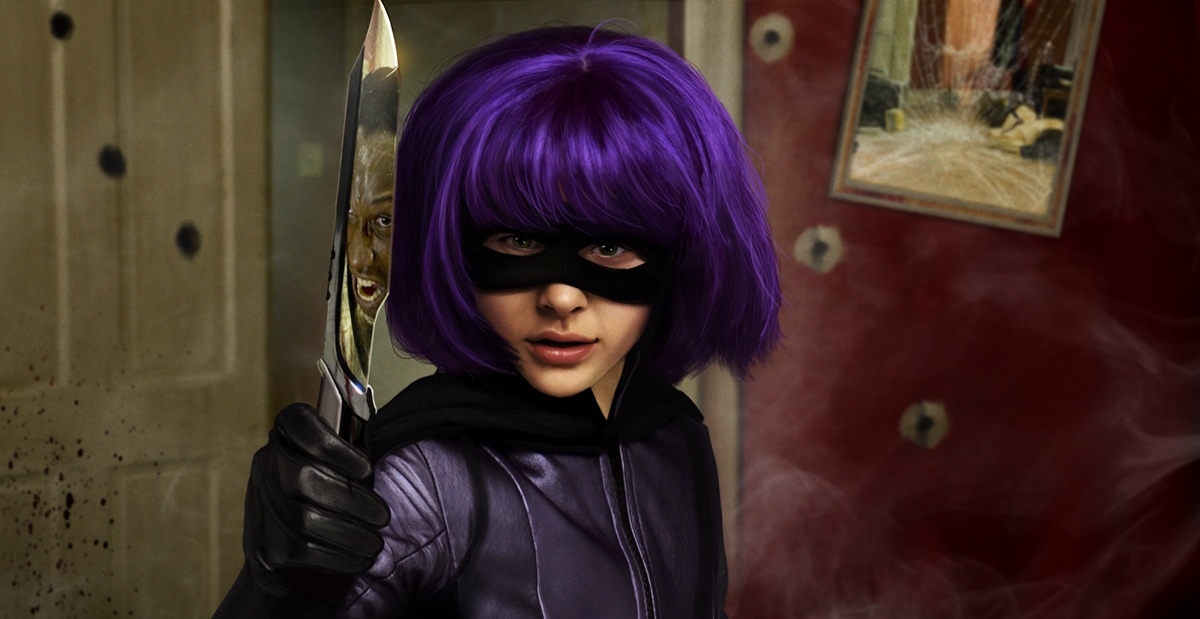 Chloë Grace Moretz as the fierce and fearless Hit-Girl in Kick-Ass, ready for action with her signature purple wig and deadly blade