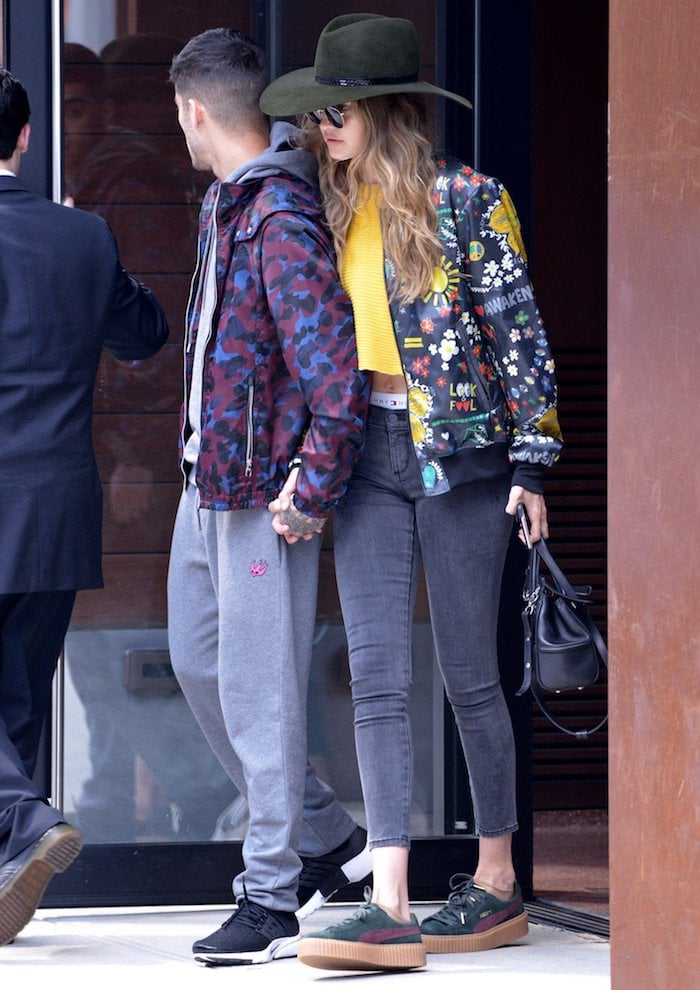 Zayn Malik and Gigi Hadid hold hands as they leave Gigi's New York City apartment