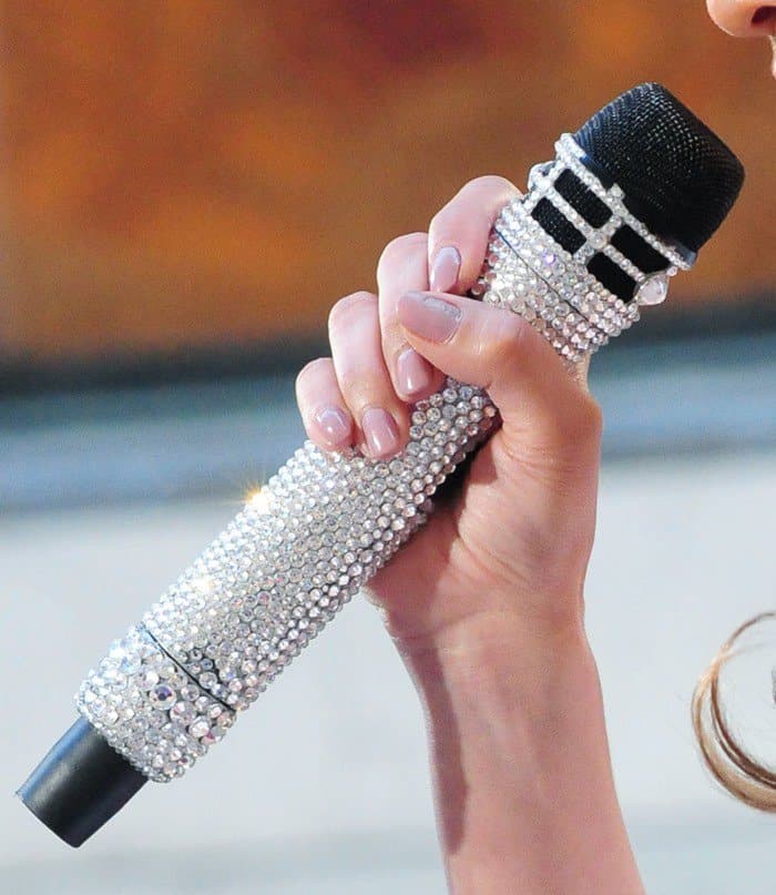 Jennifer Lopez adds a personal touch to her performance with a dazzling crystal-embellished microphone