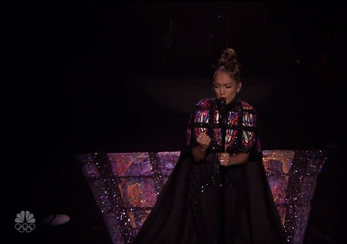 Jennifer Lopez stuns in a Michael Cinco jumpsuit and stained glass-inspired cape adorned with thousands of Swarovski crystals