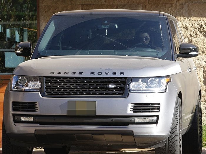Kendall Jenner gets behind the wheel of a Range Rover after lunch at Nobu