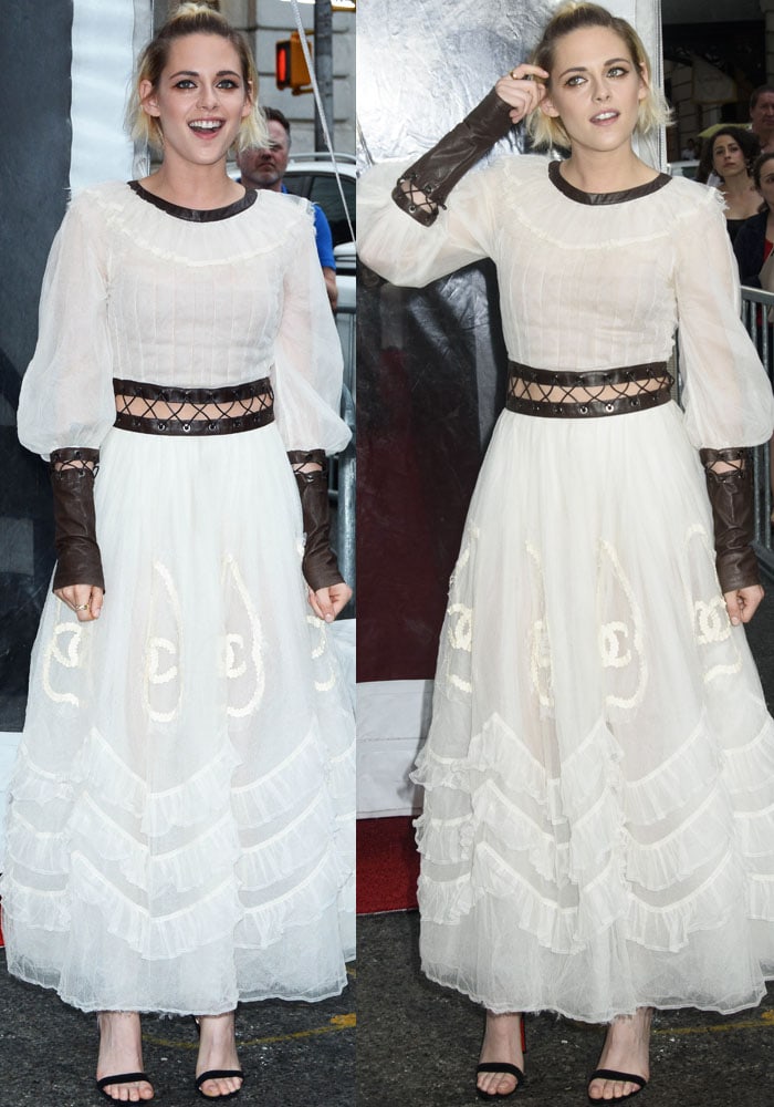 Kristen Stewart turns heads in a sheer ruffled Chanel Fall 2016 dress with leather cuffs and waistband, paired with black Christian Louboutin Jonatina sandals featuring sleek PVC ankle straps at the Café Society New York premiere