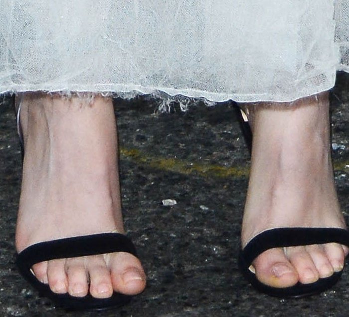 Fashion forward: Kristen Stewart's unique PVC-strapped Christian Louboutin 'Jonatina' sandals offer a twist of style at the 'Cafe Society' premiere