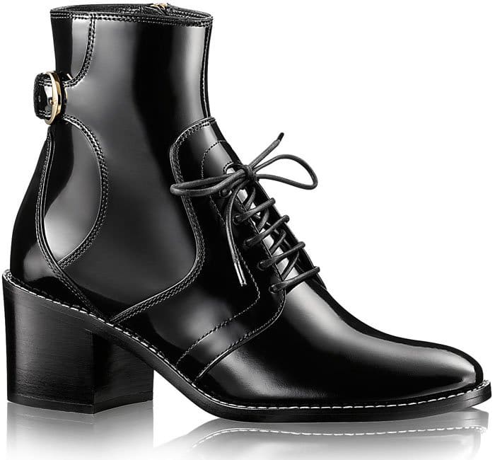 Louis Vuitton “Republic” patent leather ankle boots, featuring a glossy finish, lace-up fronts, rounded almond toes, and chunky block heels that balance moto-inspired edge with refined craftsmanship