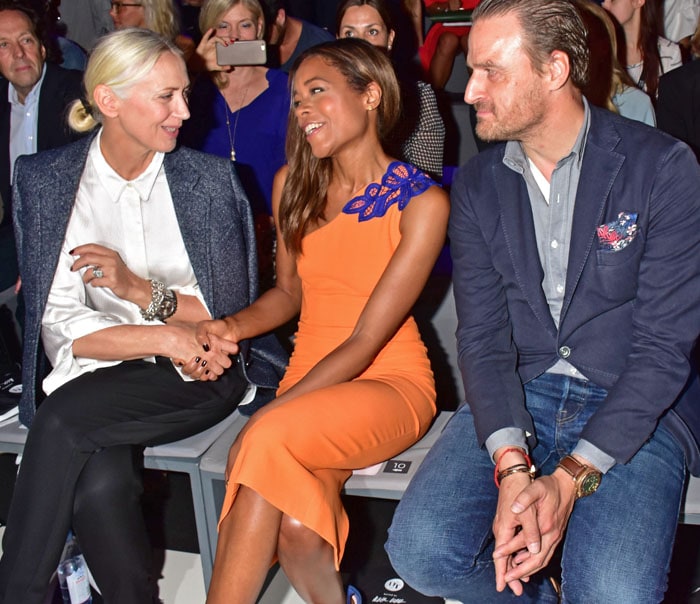 Editor in chief of Vogue, Christiane Arp, Naomie Harris in a colorful Victoria Beckham dress, and John Cloppenburg attend the 'Designer for Tomorrow' during the Mercedes-Benz Fashion Week Berlin Spring/Summer 2017