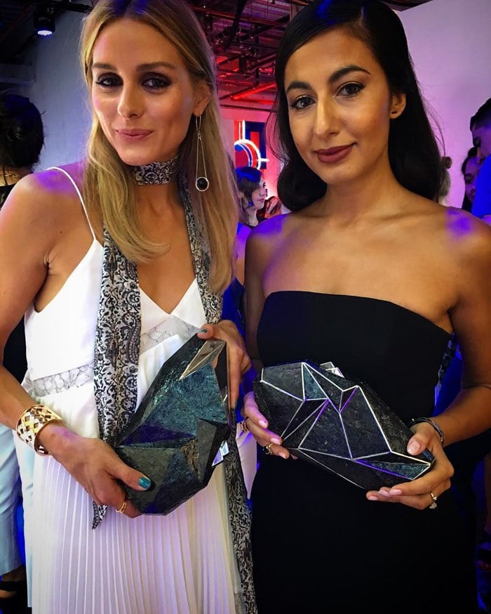Olivia Palermo and stylist Nausheen Shah coordinate their looks with matching geometric Nathalie Trad clutches, showcasing their individual takes on statement accessories