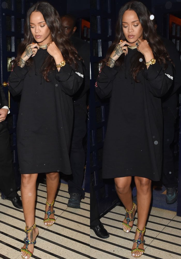 Stepping out in kaleidoscopic Christian Louboutin “Devibroda” sandals, Rihanna transforms a casual hoodie dress into a striking high-low statement with jewel-like, crystal-embellished heels