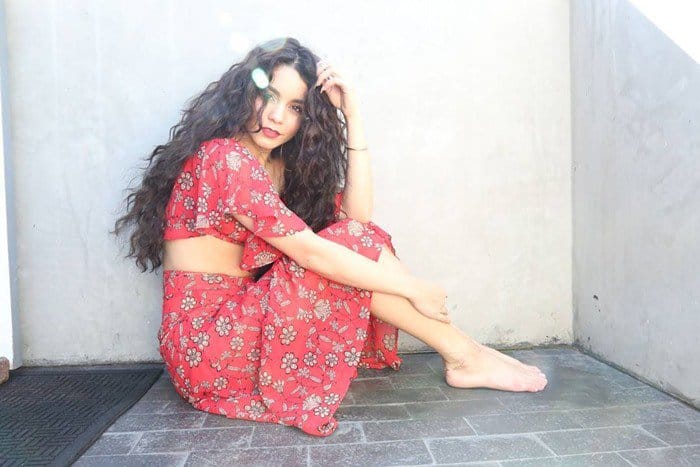 Vanessa Hudgens wears a For Love  Lemons Pia crop top with a matching floral print skirt