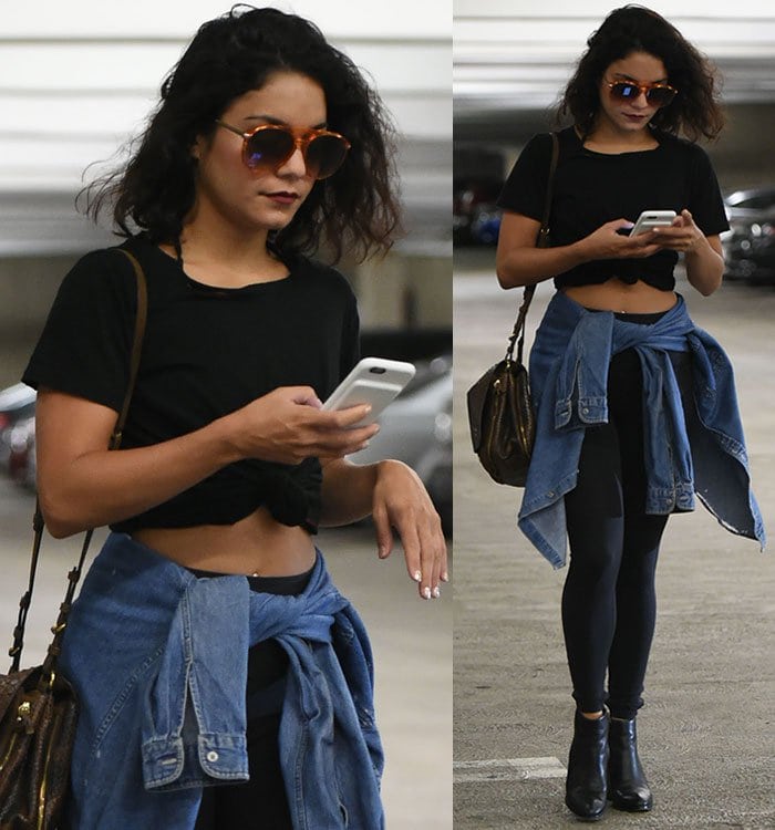 Vanessa Hudgens completes her casual look with natural curls and a bold red lipstick