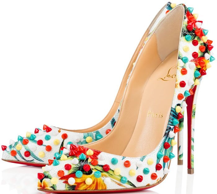 Christian Louboutin’s multicolor “Follies Spikes” pumps showcase hand-applied studs in vibrant hues atop a patterned base, transforming the iconic silhouette into a playful, fashion-forward statement