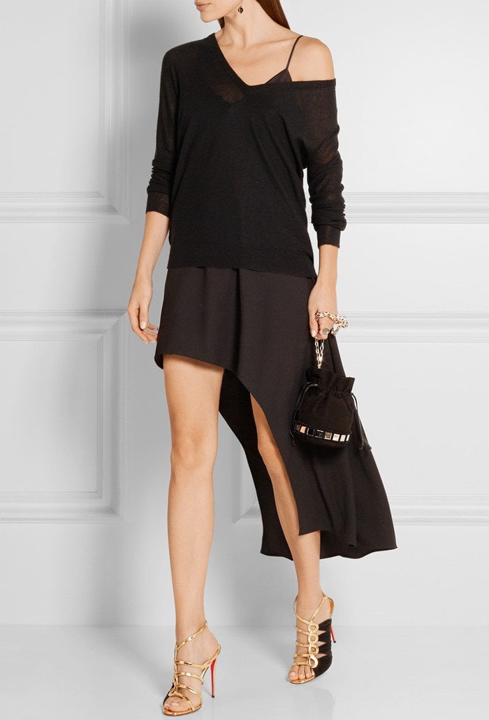 Model wearing Tina Cage sandals with an asymmetric satin-paneled crepe mini dress from Halston Heritage