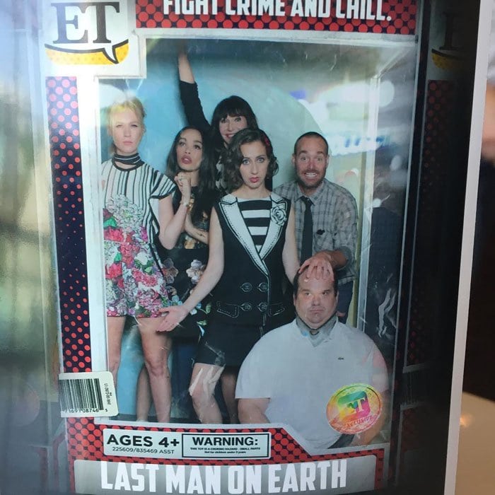 January Jones and her Last Man on Earth co-stars strike a playful pose as life-size “Barbie dolls,” showing off their Comic-Con outfits inside a collectible-style display