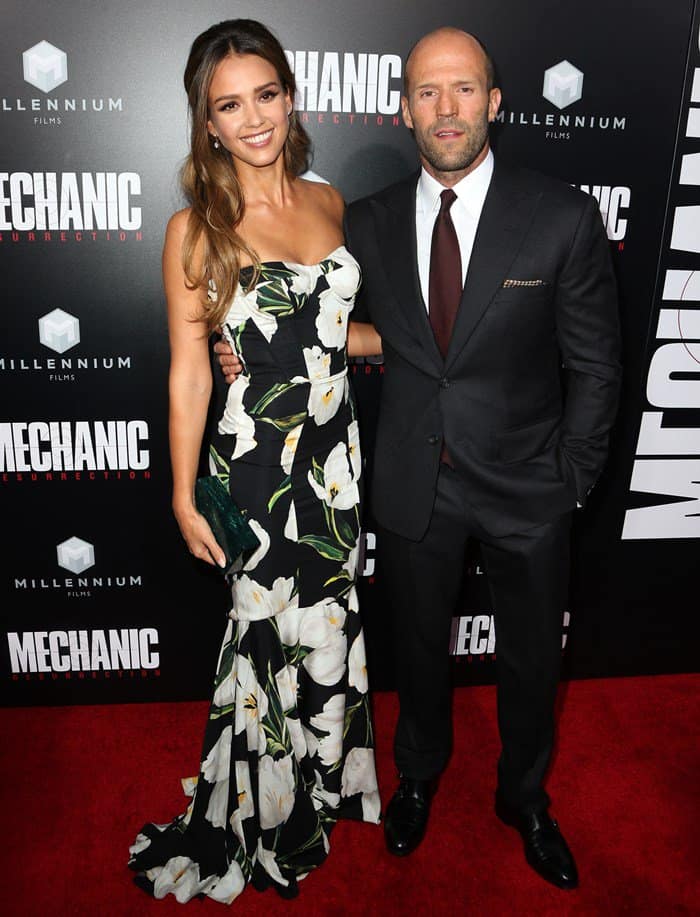 Standing taller than her 5-foot-8¾ co-star Jason Statham thanks to her heels, 5-foot-6¼ Jessica Alba stunned in a strapless floral Dolce Gabbana gown at the Mechanic: Resurrection premiere at ArcLight Hollywood on August 23, 2016