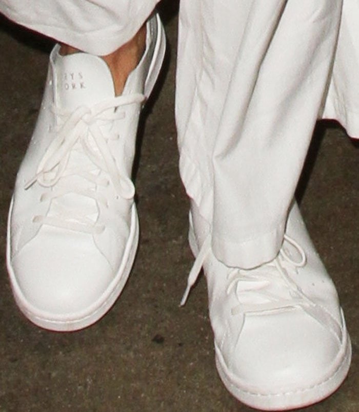 Karlie sports the collaboration Stan Smith sneakers between Adidas and Barneys New York
