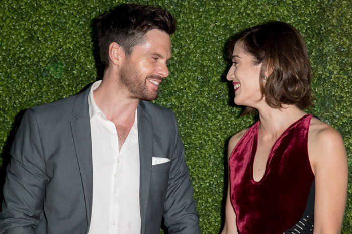 Lizzy Caplan was all smiles next to her fiancé Tom Riley