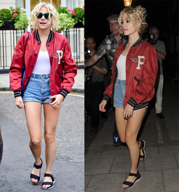 Pixie Lott keeps it effortless in denim cutoffs and a white top, layering a red varsity bomber over the look and finishing with sporty black sandals that add a relaxed, off-duty edge