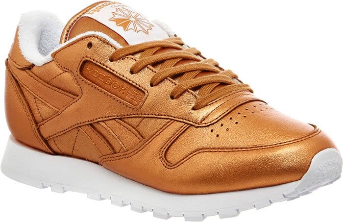 A product shot of the Reebok x FACE Stockholm “Spirit” sneaker in bronze leather