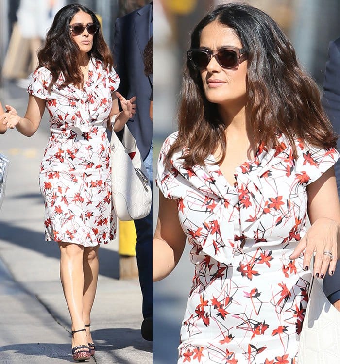 Salma Hayek arrives at ABC Studios, looking effortlessly chic in a white and red floral-printed dress with a playful pussy bow detail