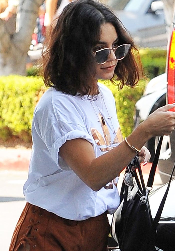 Vanessa Hudgens wears her hair down as she visits Alfred Coffee Kitchen