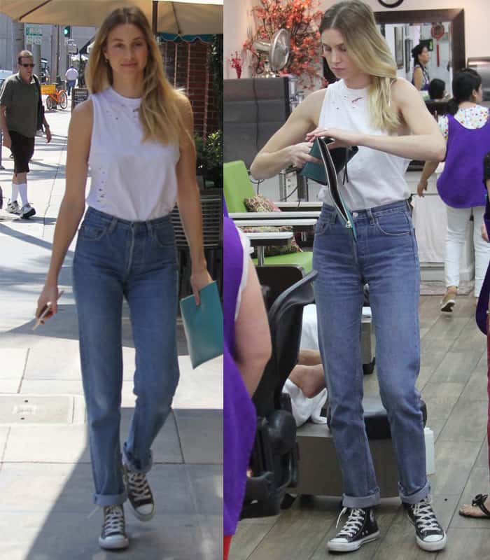 Whitney Port showcases a stylish and laid-back vibe by pairing high-waisted jeans with a white sleeveless top and classic high-top sneakers