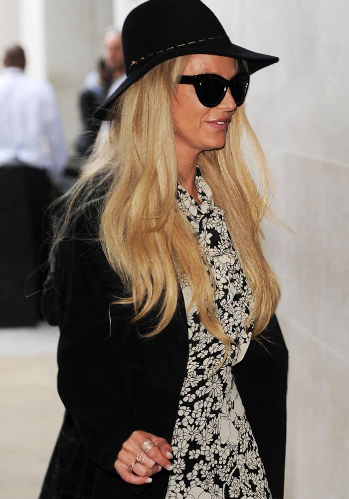 Britney Spears in a black coat outside BBC Radio 1 in London on September 28, 2016