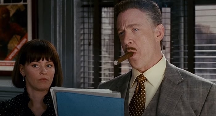 Elizabeth Banks plays Betty Brant opposite J.K. Simmons in Spider-Man, wearing a retro office-inspired blouse
