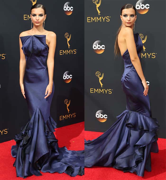 Emily Ratajkowski stuns in an eggplant-colored, mermaid-style Zac Posen gown featuring a structured bodice and dramatic ruffled train at the 2016 Primetime Emmy Awards