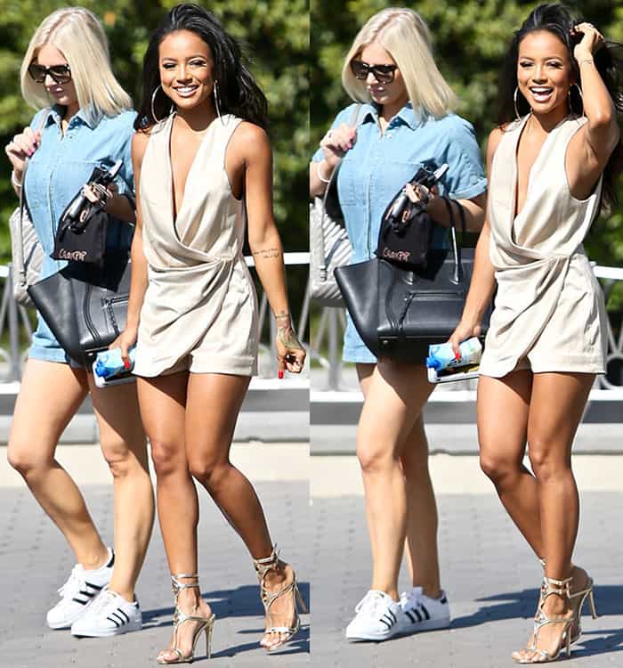 Karrueche Tran flashed a bright smile while striding through Universal Studios in sky-high metallic heels that added dramatic height to her petite frame