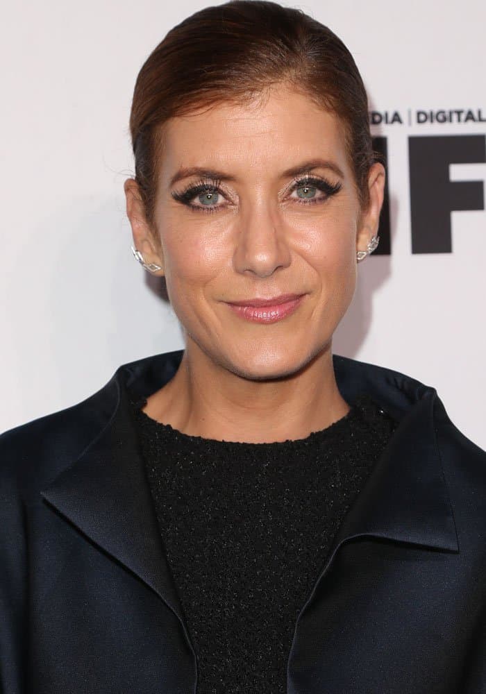 Kate Walsh stuns in a sleek black ensemble, showcasing her timeless elegance at the Variety And Women In Film's Pre-Emmy Celebration